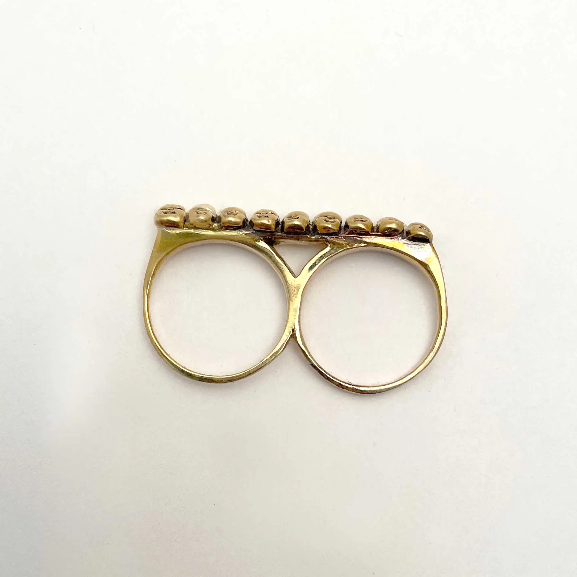 Baby Heads Knuckle Ring