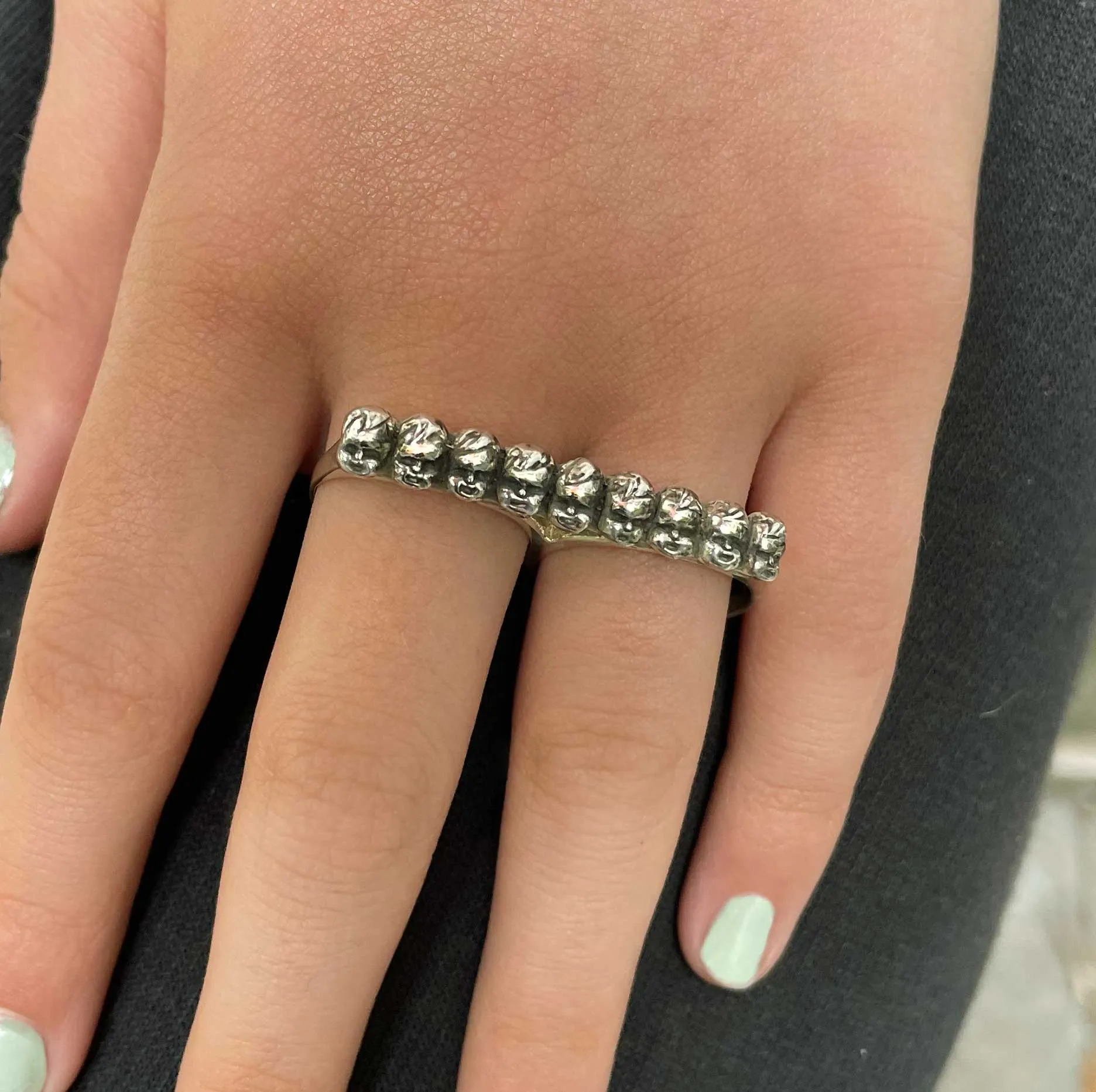 Baby Heads Knuckle Ring