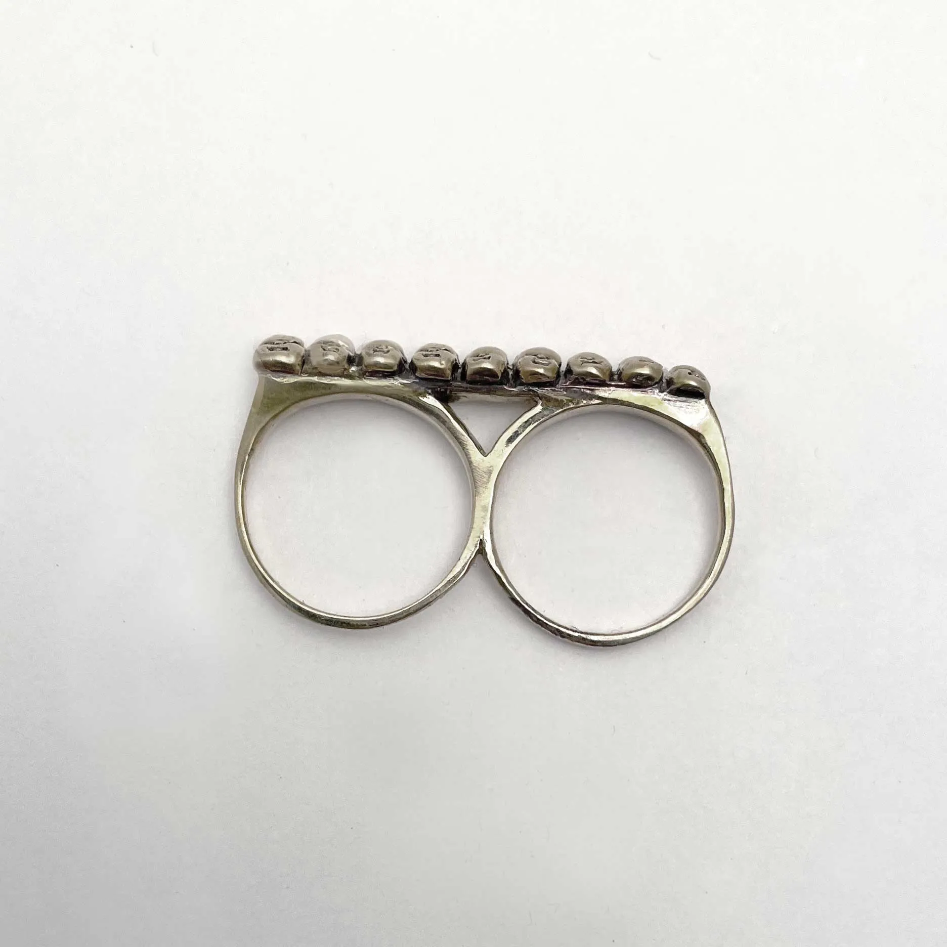 Baby Heads Knuckle Ring