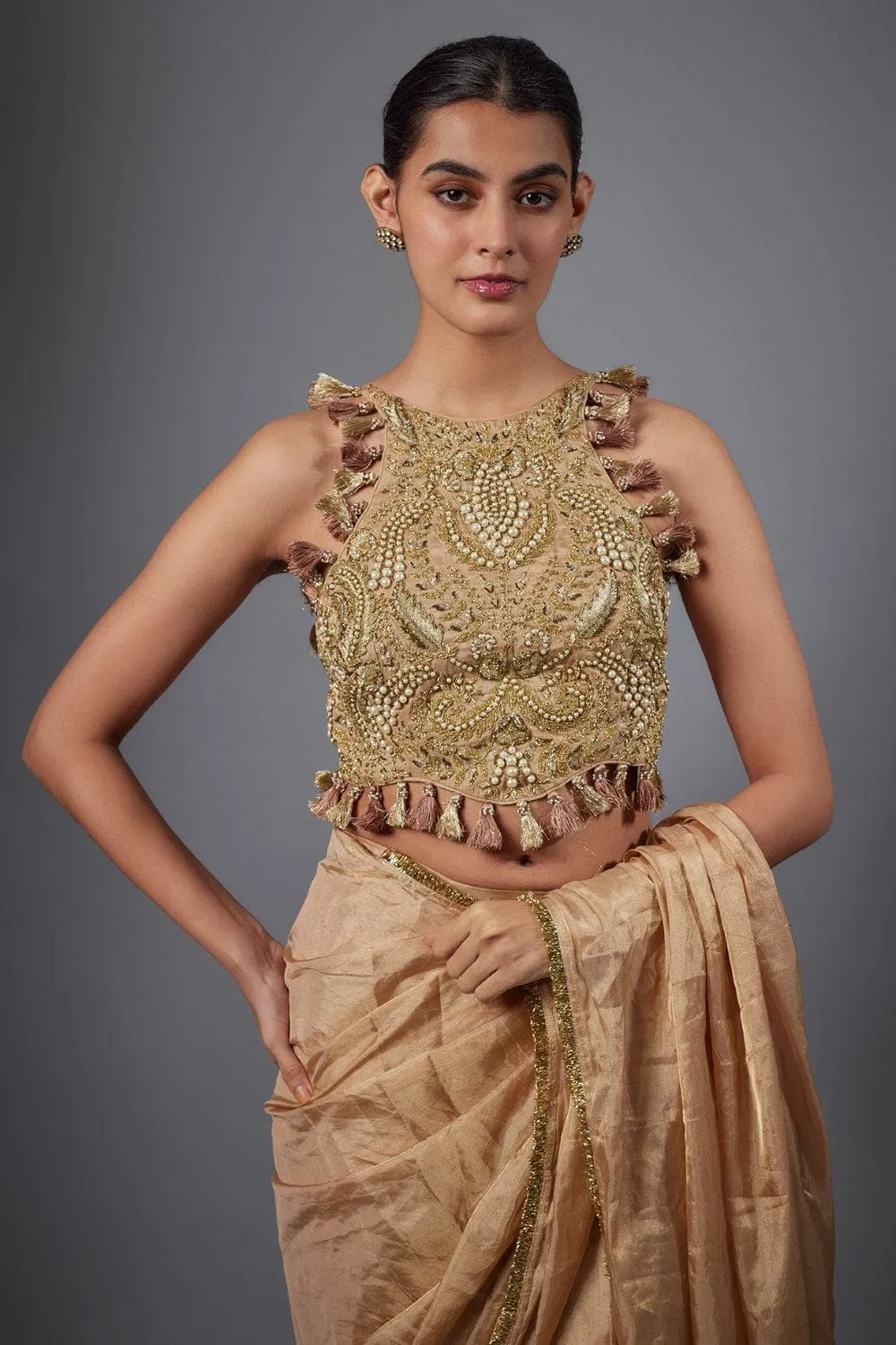 Dull Rose Color Embroidered Tissue Fabric Short Choli With Stitched Saree.