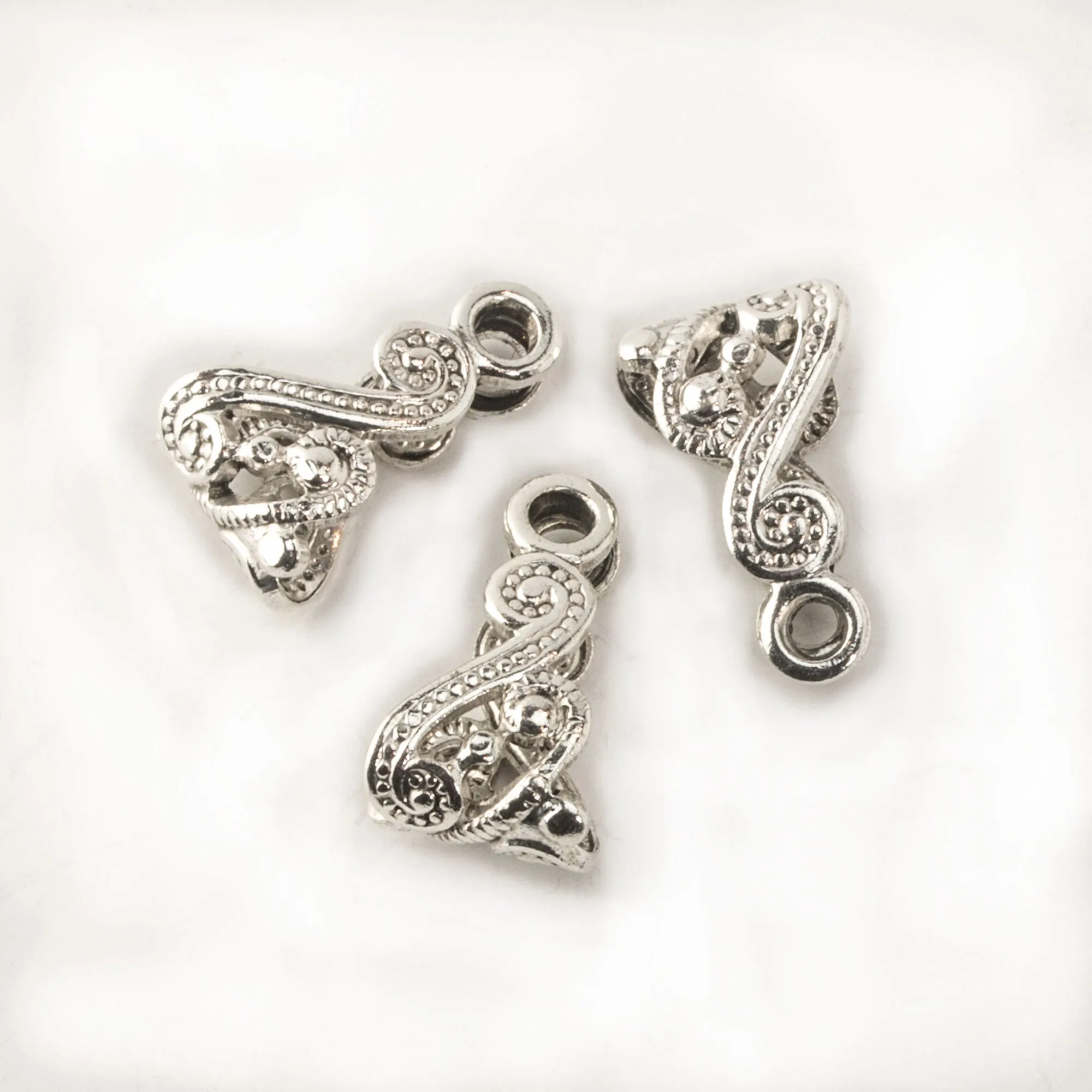 Sterling silver plated brass filigree bail. 13x8mm. Sold individually. b9-2359s