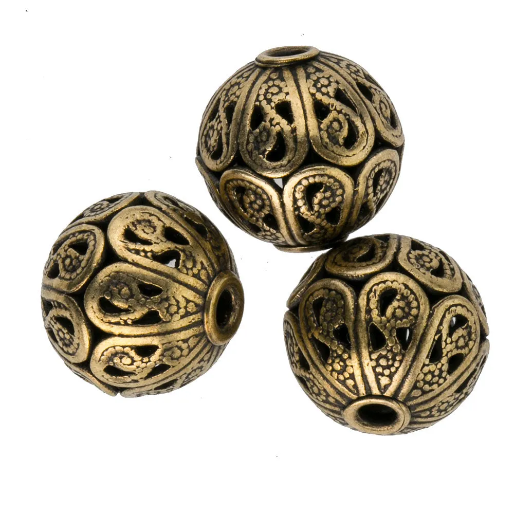 superb quality solid brass filigree bead. 10x11mm. Pkg of 1. b18-0135