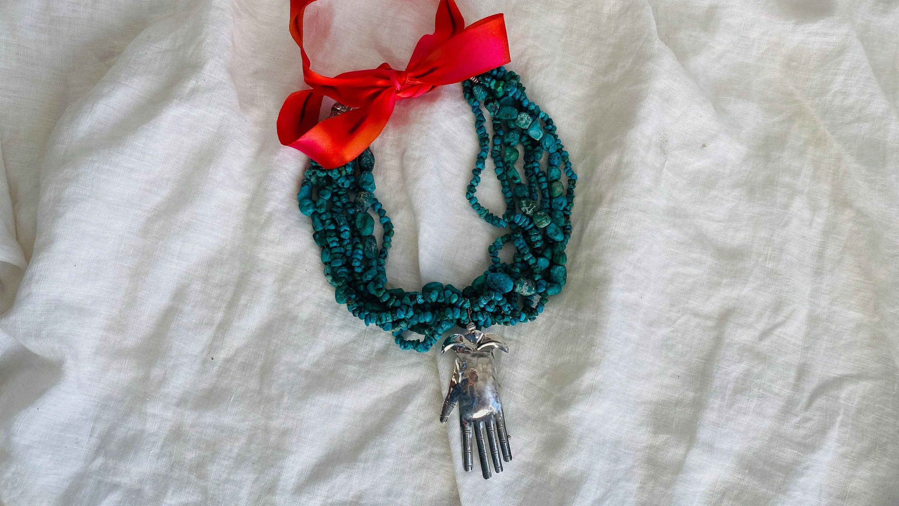 Turquoise and Silver Multi-Strand Necklace.
