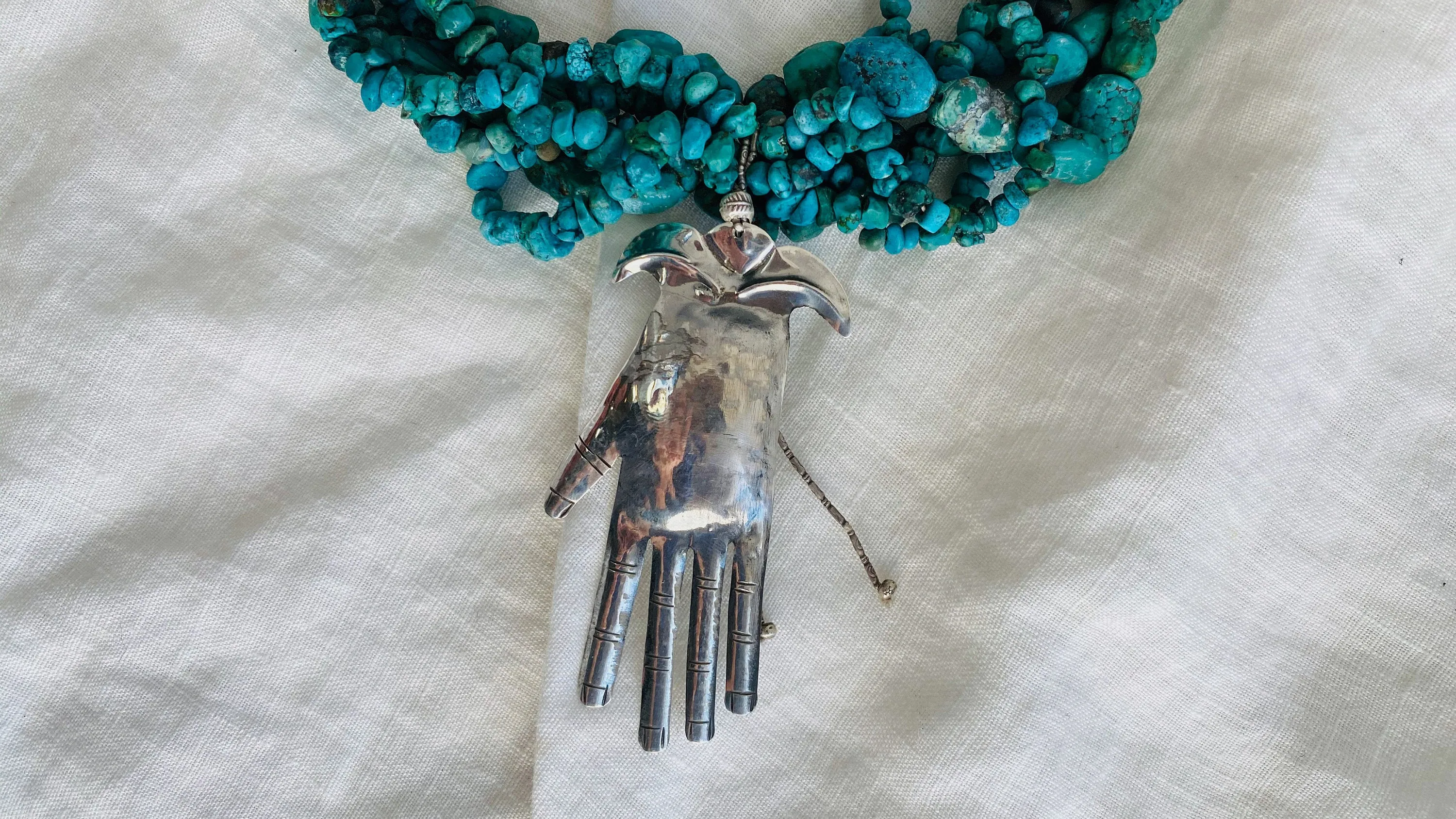 Turquoise and Silver Multi-Strand Necklace.